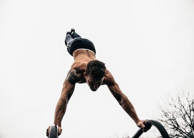 Man doing hand stand competition