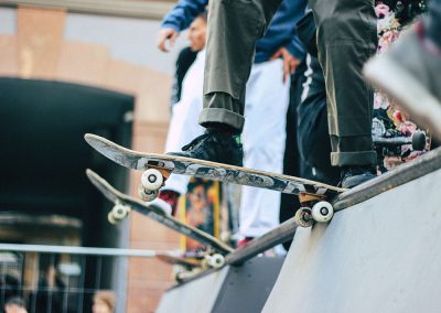 Skateboarders about to go down a hill